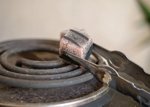 How to heat up coals for hookah?